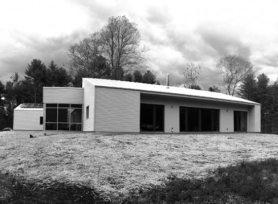 South facade with screen porch at southwest corner